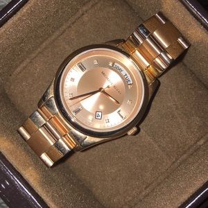 Lightly worn Michael Kors rose gold watch.